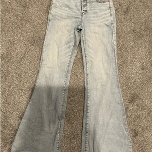 American Eagle Next Level Stretch distressed blue denim jeans boot cut size 8